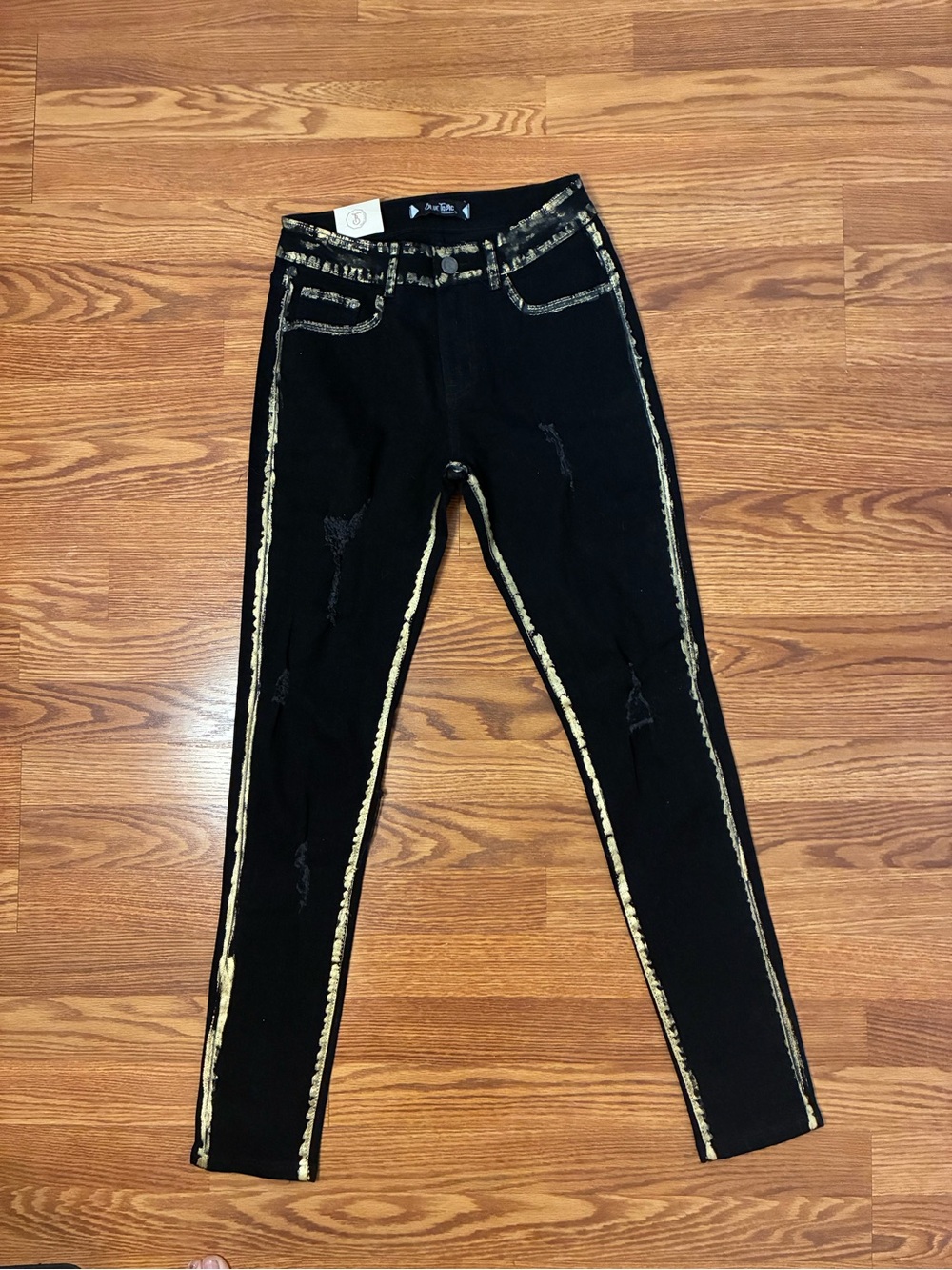 Black Skinny Jeans with Metallic Gold Trim - Women